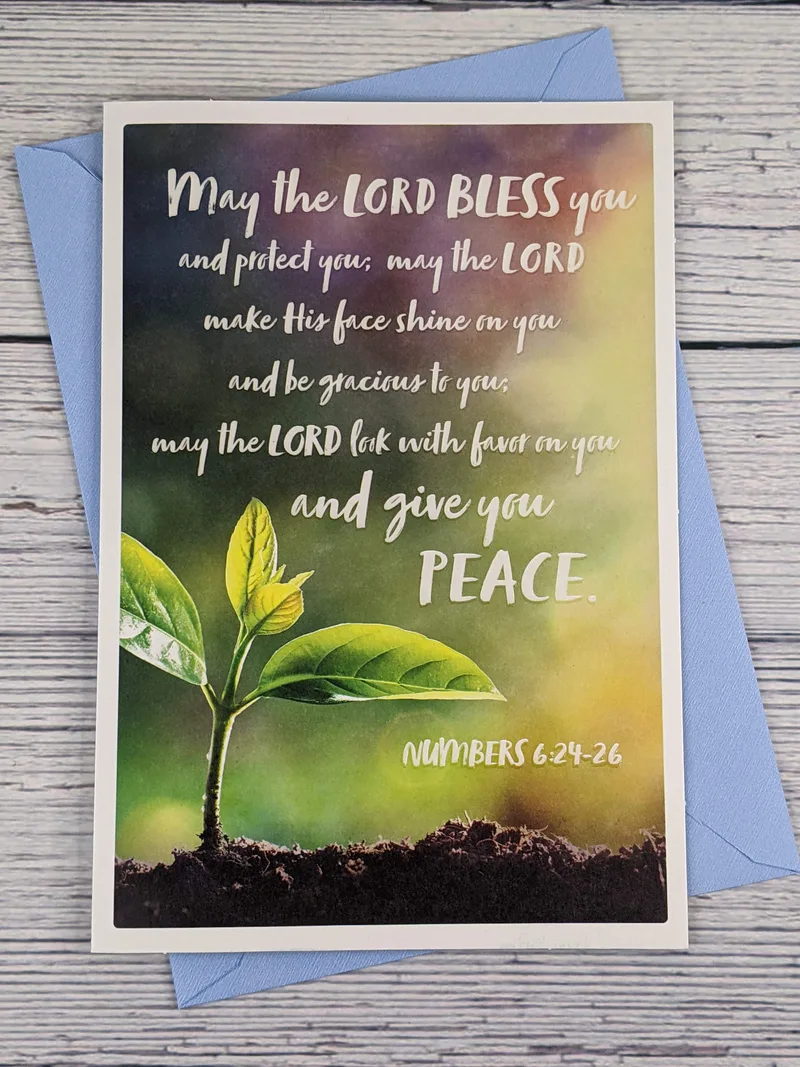 A religious Father's Day greeting card with an image of a plant growing from the dirt.