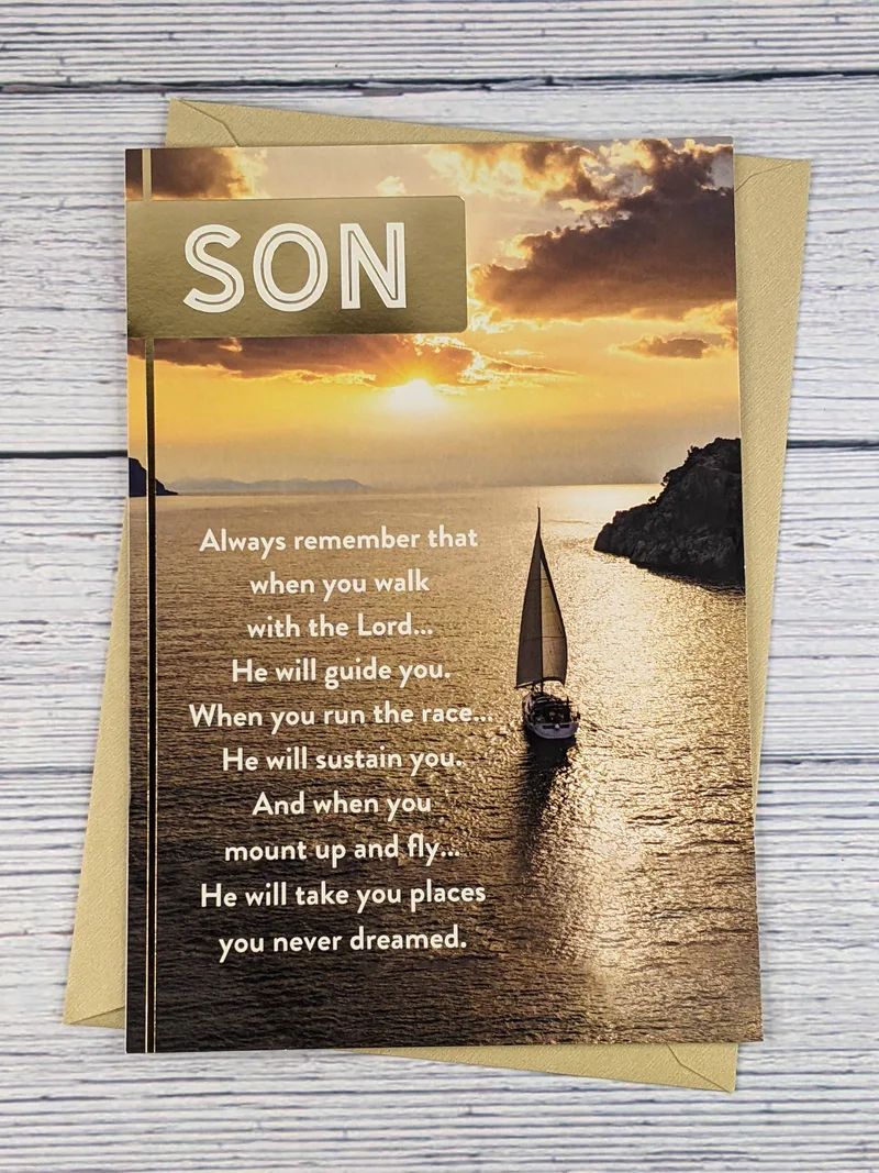 A religious SON birthday card with an image of a sailboat on a lake in the sunshine.