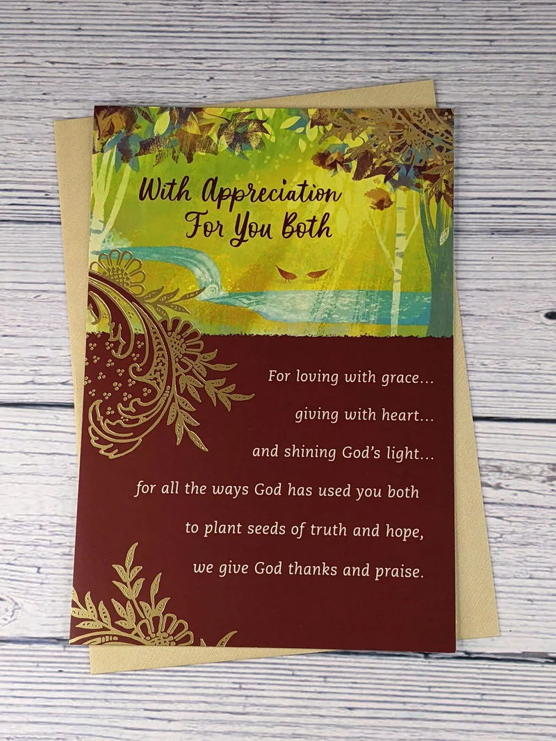 A pastor appreciation card for a minister and their spouse. It has a brown and green design on the cover and a religious sentiment.