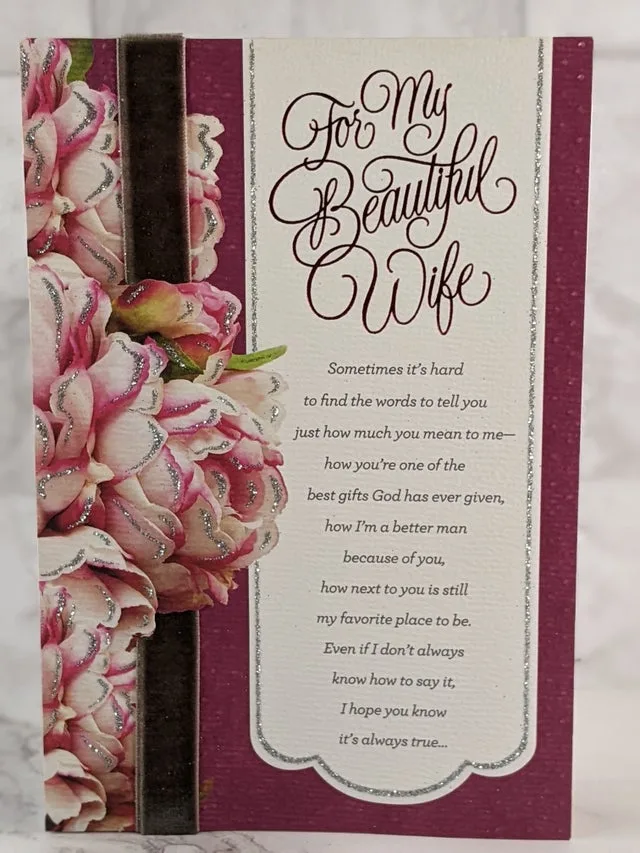 A Christian birthday greeting card for a wife with a lovely floral design and sentimental message on the front cover.