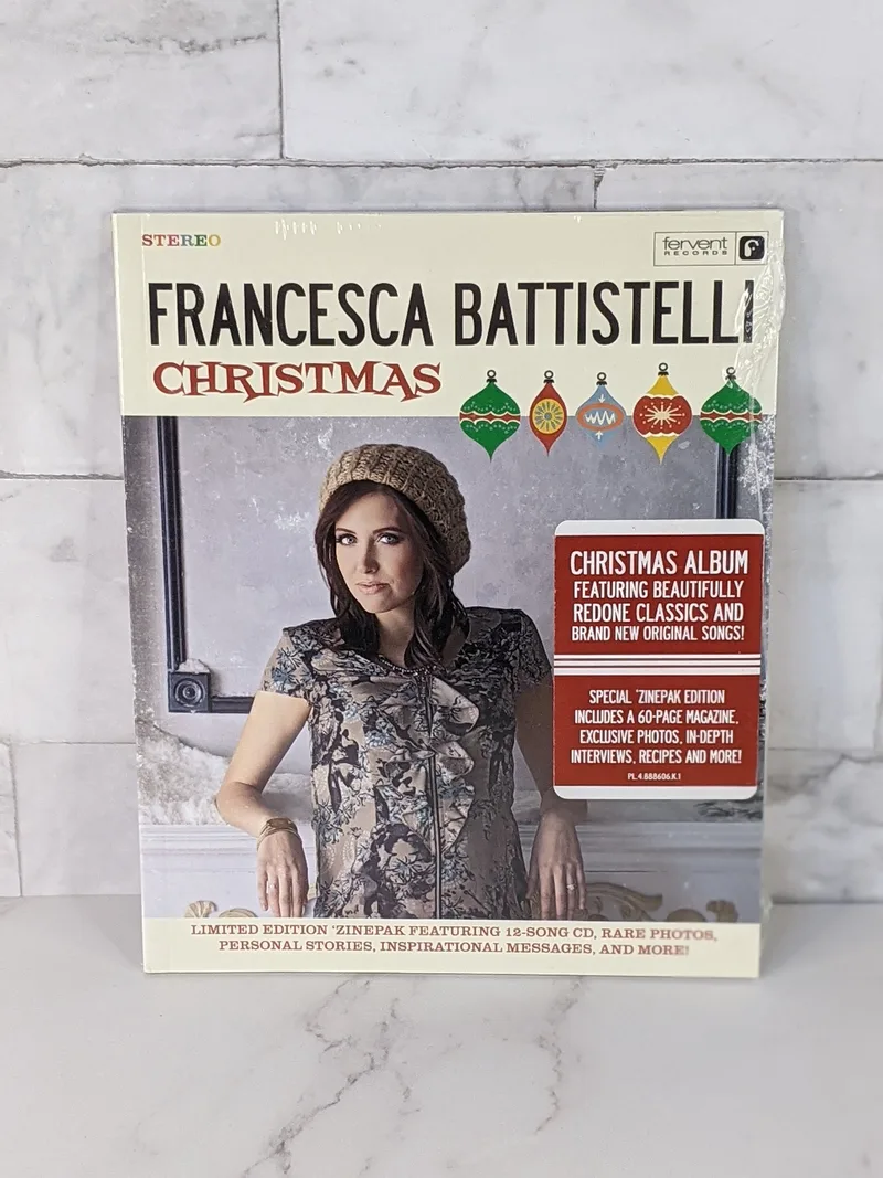 A Christmas CD by Francesca Battistelli, with an image of her on the cover of the slip-case.