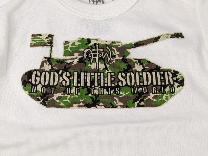 A white shirt for a baby with the words, "God's little soldier"